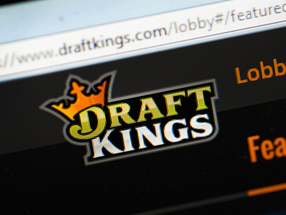 DraftKings and its rival FanDuel have agreed to suspend paid contests in New York temporarily. (Scott Olson/Getty Images)