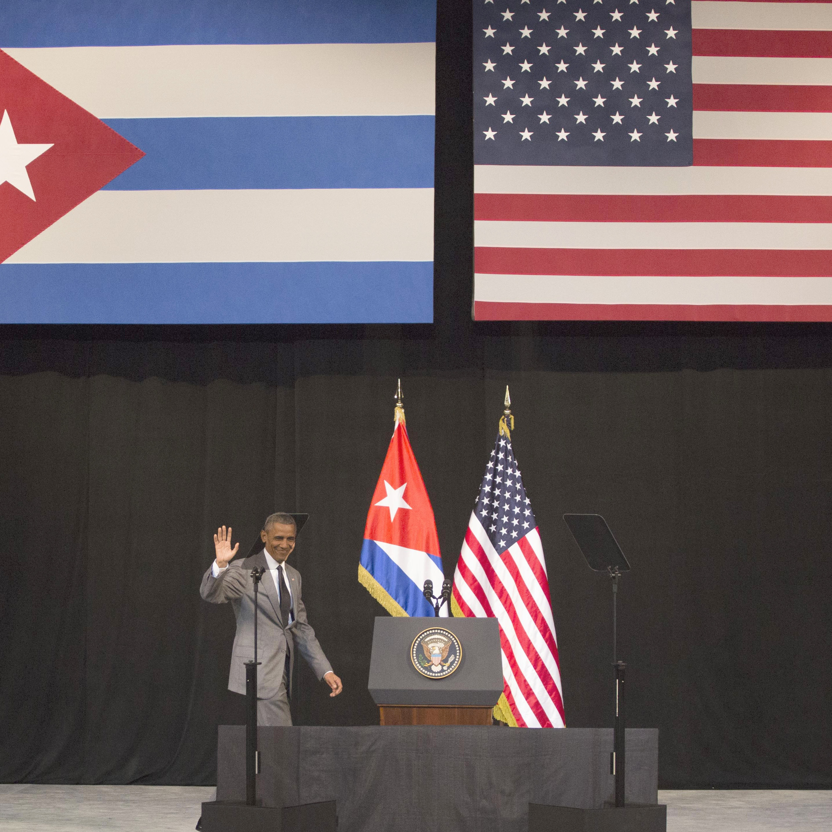 President Obama arrives at the podium to address the Cuban people at the National Theater in Havana on Tuesday. He said the two countries should let go of the past and benefit from better relations in the future.