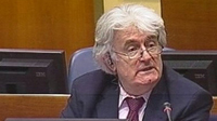 Bosnian Serb wartime leader Radovan Karadzic sits in the courtroom for the reading of his verdict Thursday in The Hague.