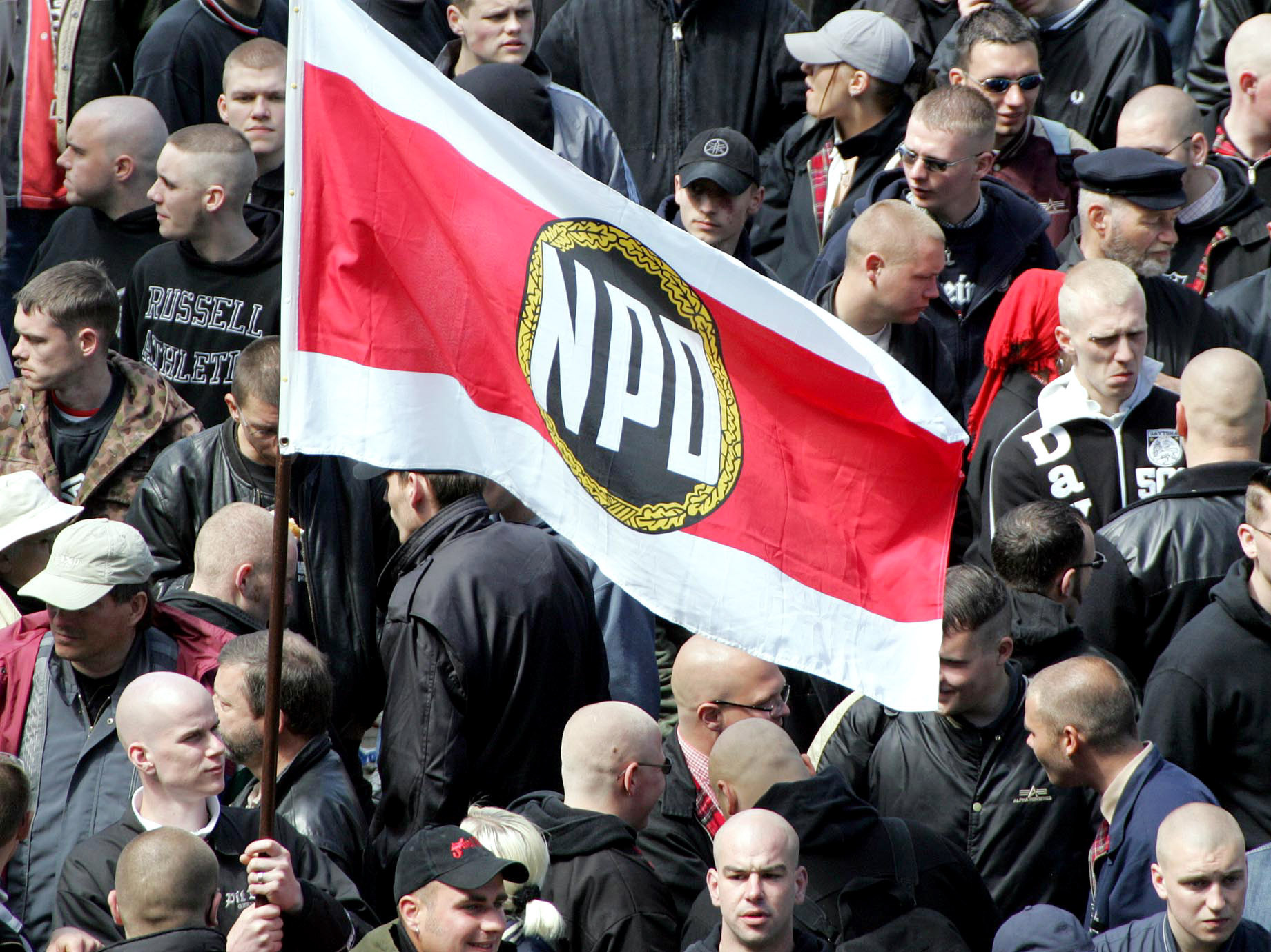 In this May 8, 2005 photo, supporters of the far right party NPD gather at Berlin's Alexanderplatz square.