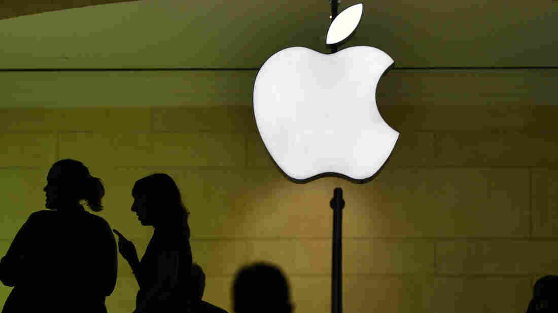 Customers visit the Apple store at Grand Central Terminal in New York on March 1.