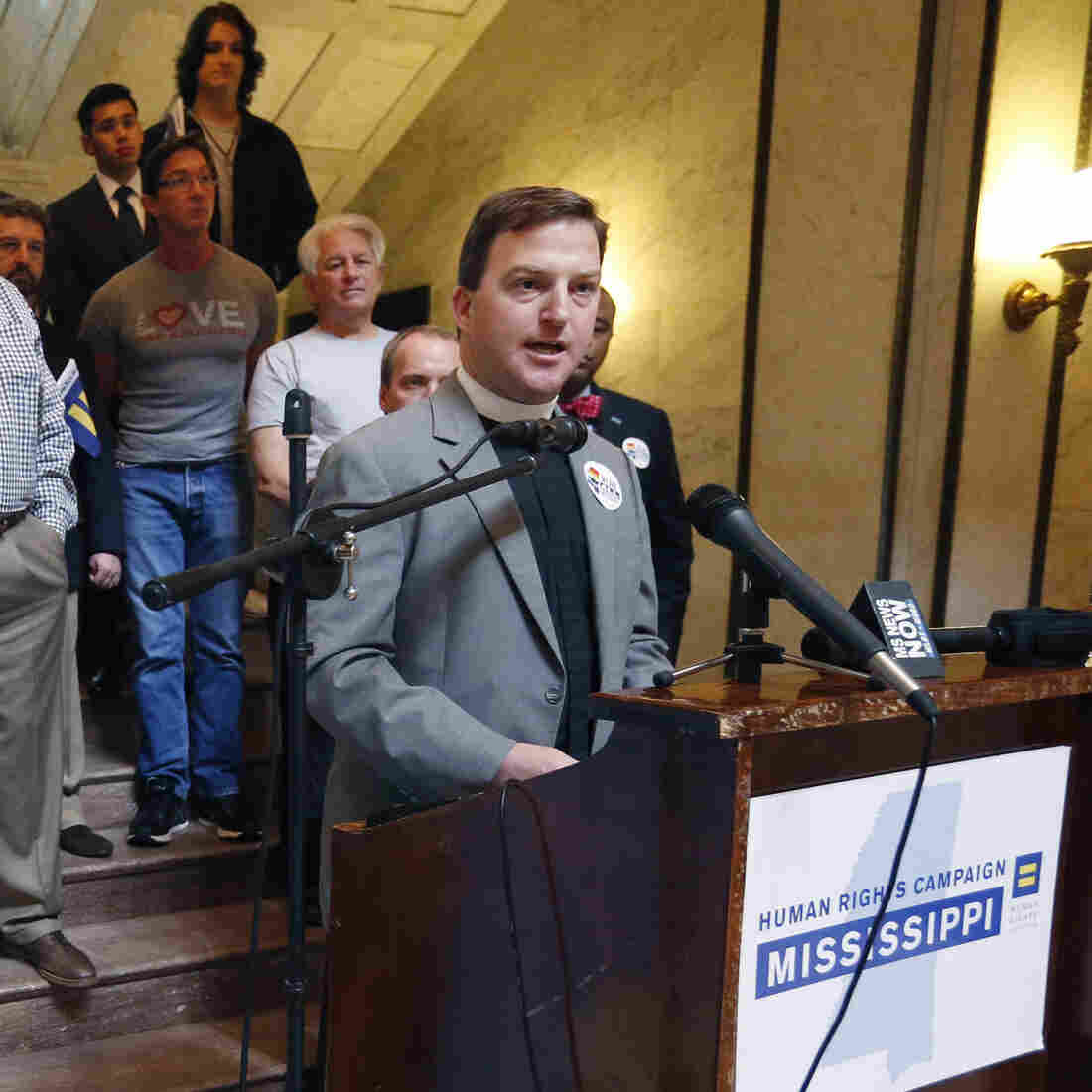 The Rev. Chris Donald, a Methodist chaplain at Millsaps College, joins other human rights advocates Wednesday at the state Capitol's rotunda, calling for the Mississippi Senate to defeat what they believe is a discriminatory anti-LGBT bill. The Senate passed the bill, which is now on the governor's desk.