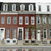 Rowhouses in Baltimore sit across the street from a church where Sen. Barbara Mikulski, D-Md., held a meeting last summer about, among other things, reducing ex-convict recidivism. Rowhouses in Baltimore sit across the street from a church where Sen. Barbara Mikulski, D-Md., held a meeting last summer about, among other things, reducing ex-convict recidivism.