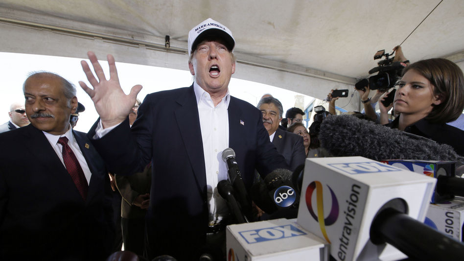 Donald Trump speaks at a news conference during a trip to the U.S.-Mexico border in Laredo, Texas, in July 2015. (LM Otero/AP)
