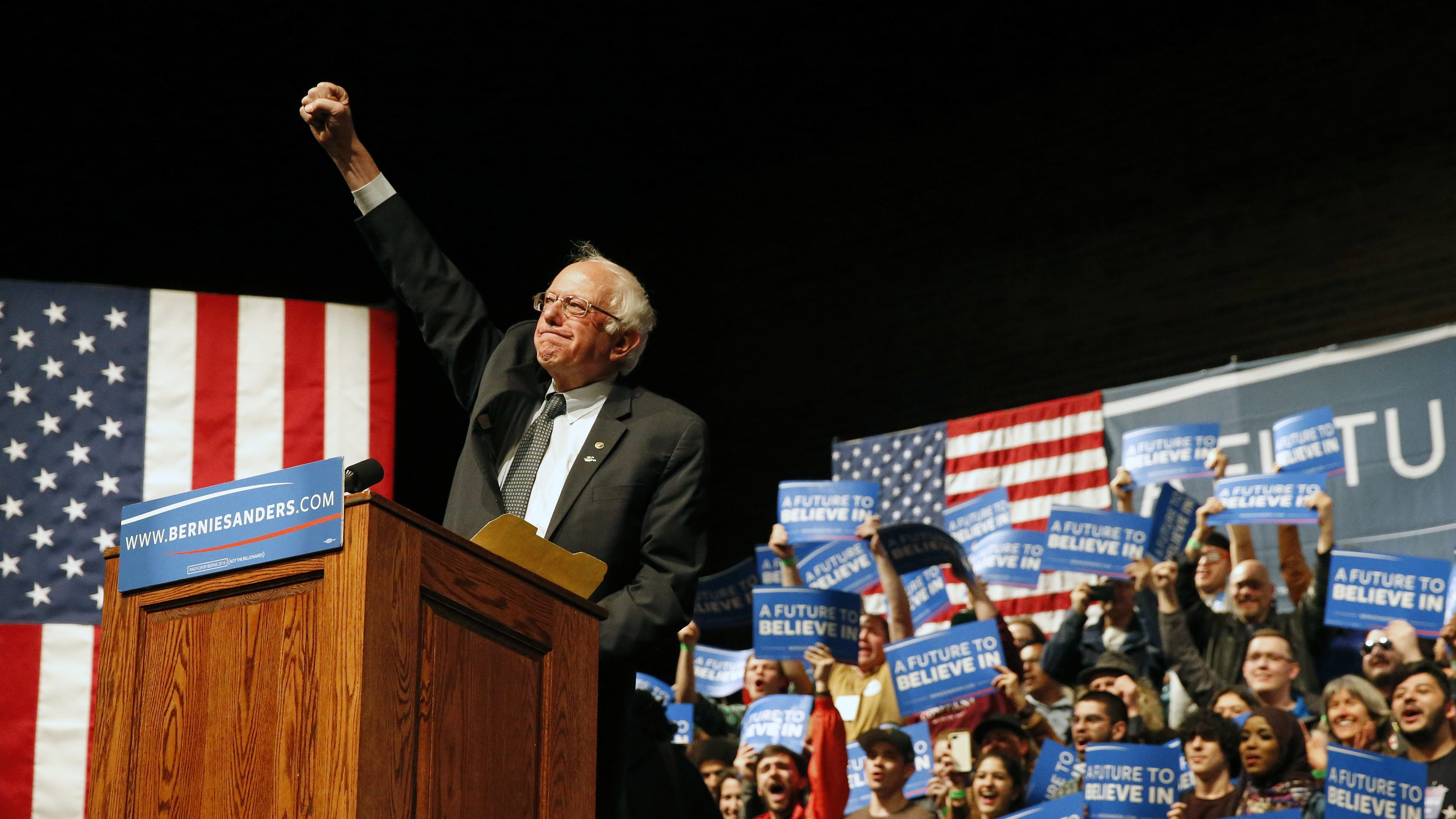 Bernie Sanders, I-Vt., pumps his fist during a campaign rally in Laramie, Wyo., Tuesday.