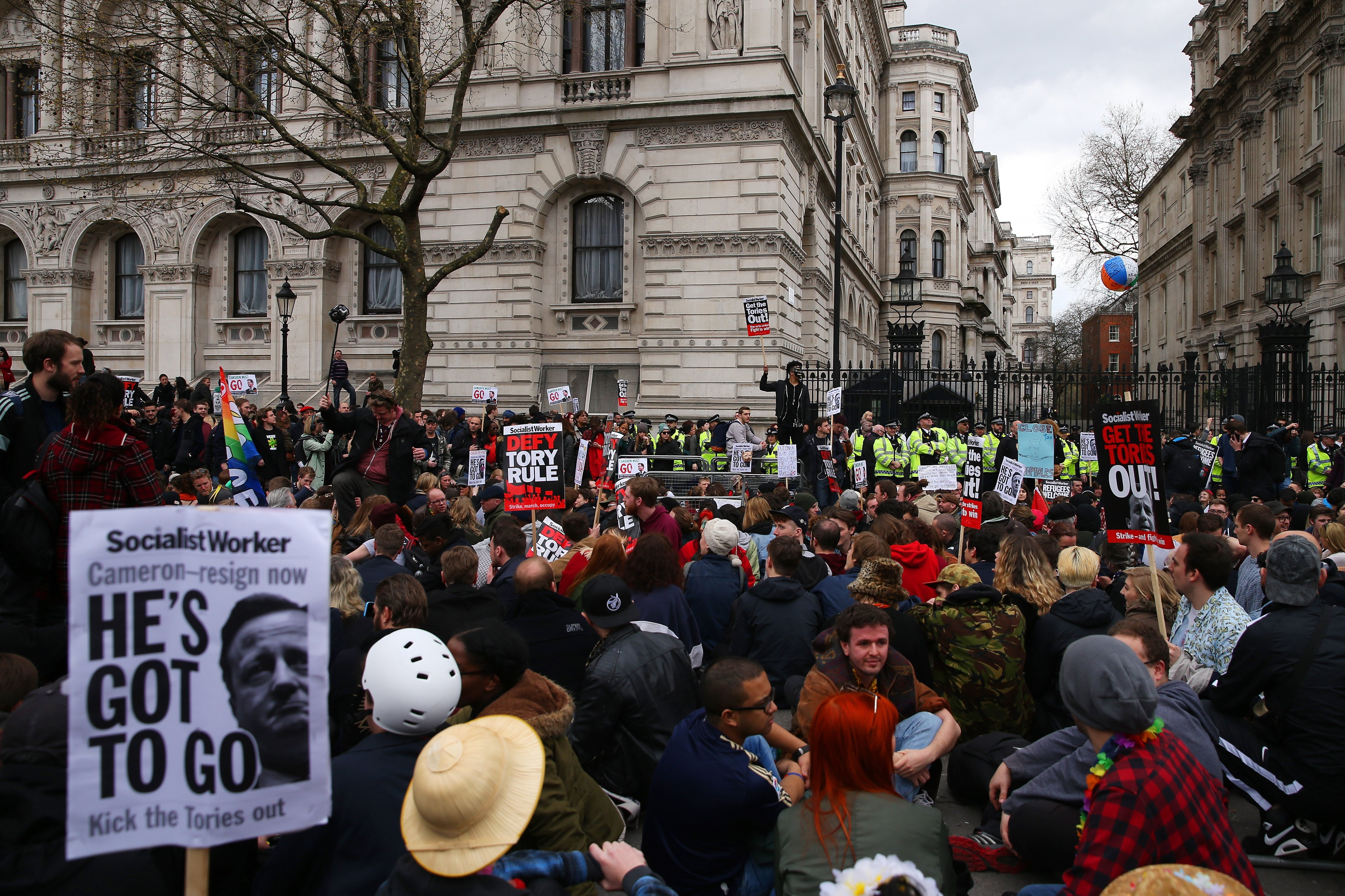 Demonstrators rally outside Downing Street Saturday in London.