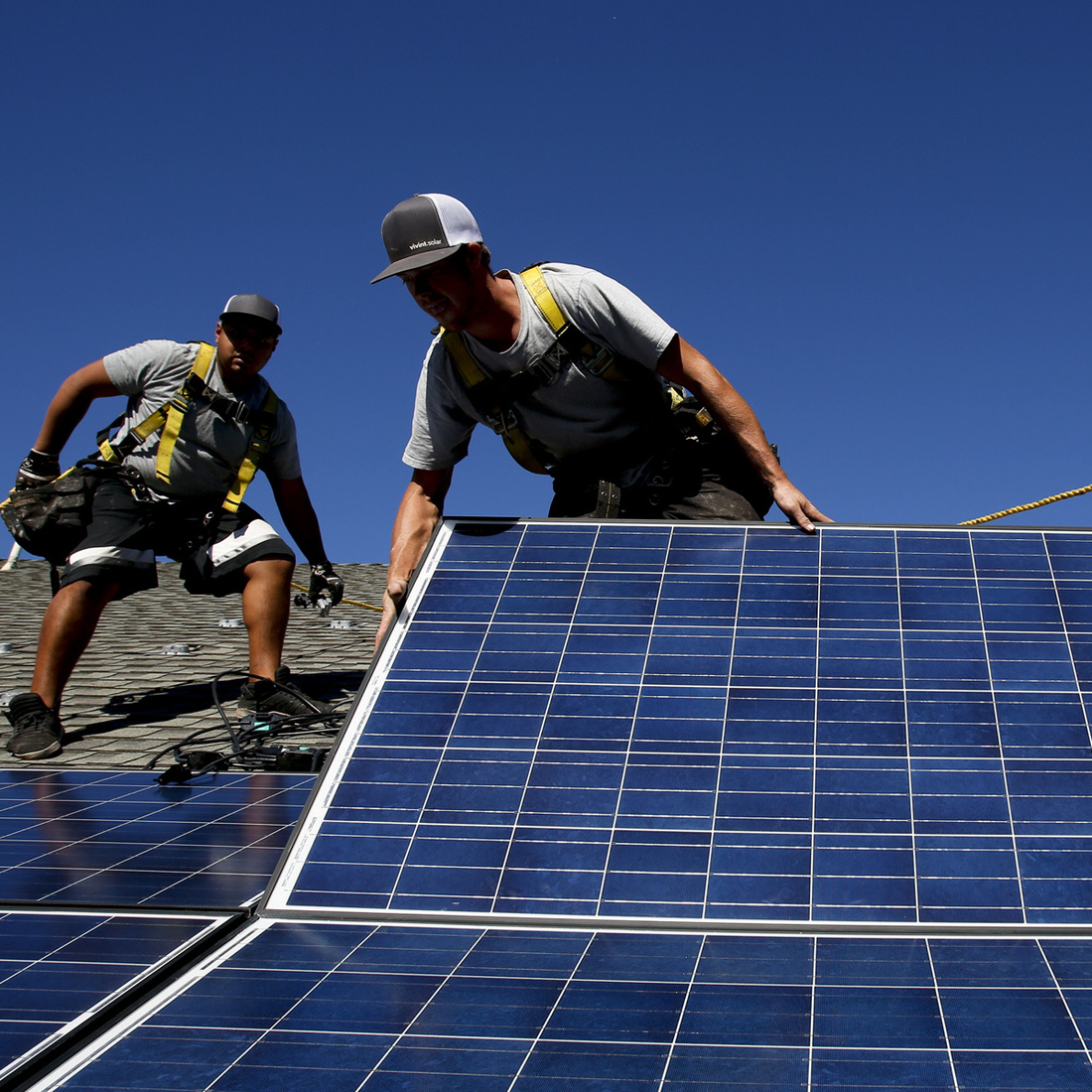 Workers install solar panels on the roof of a home in Camarillo, Calif., in 2013. San Francisco has recently decided to start requiring rooftop solar systems — electrical or heating — on new construction up to 10 stories tall. Workers install solar panels on the roof of a home in Camarillo, Calif., in 2013. San Francisco has recently decided to start requiring rooftop solar systems — electrical or heating — on new construction up to 10 stories tall.