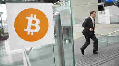 Entrepreneur Craig Wright claims that he is the creator of the Bitcoin crypto-currency. In this 2014 photo, a man arrives for the Inside Bitcoins conference and trade show in New York.