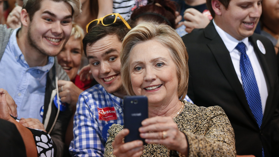 Democratic presidential candidate Hillary Clinton takes selfies with supporters at a campaign stop in Indianapolis on Sunday. (Paul Sancya/AP)