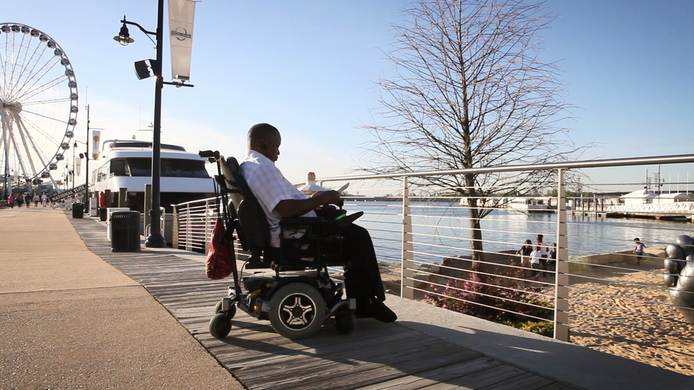 Luther checks out the waterfront near his home in National Harbor, Md.