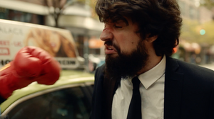 Anthony D'Amato takes one of many punches to the face in a scene from a new video for the song "Golden Gloves."