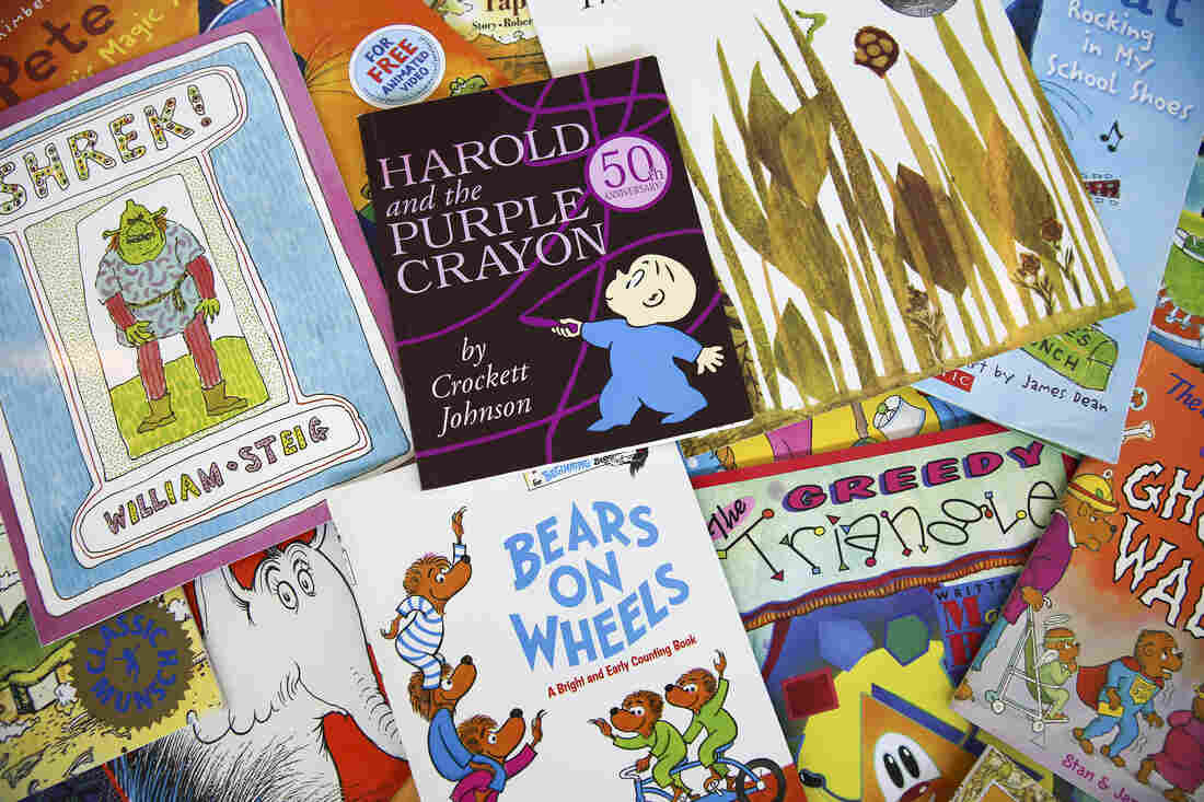 Children's books scattered on the floor