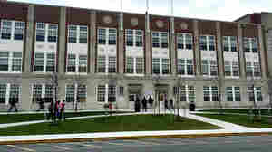 New York's Utica City School District has reached a settlement in a federal lawsuit that says it discriminated against refugee students and did not let them enroll at Thomas R. Proctor High School, shown here.