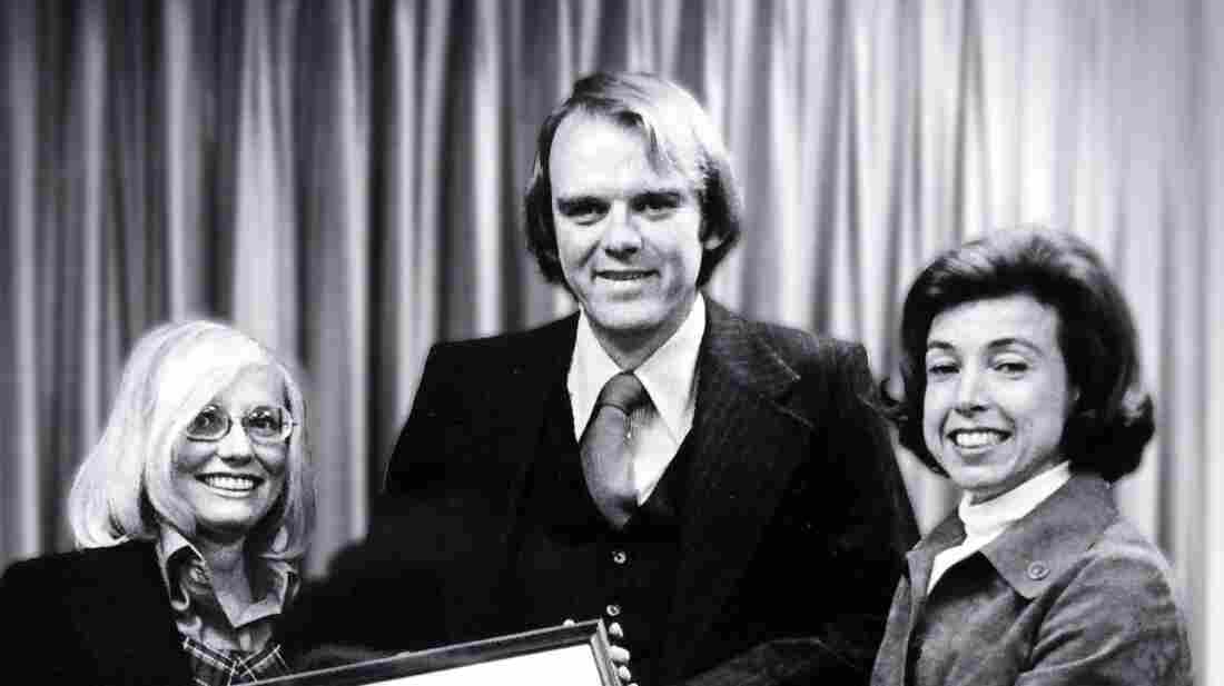 Bob Hunter became the Federal Insurance Administrator in 1976. On the right is the Secretary of Housing for Urban Development, Carla Hills, and on the left is his wife, Carole. Bob Hunter became the Federal Insurance Administrator in 1976. On the right is the Secretary of Housing for Urban Development, Carla Hills, and on the left is his wife, Carole.
