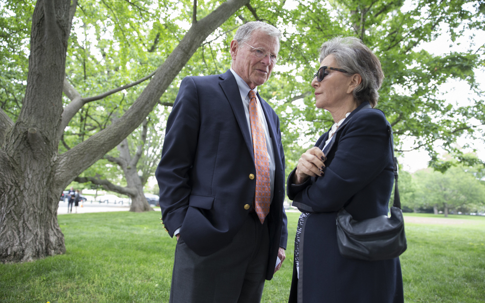 Environment and Public Works Committee Chairman Sen. James Inhofe, R-Okla., speaks with Sen. Barbara Boxer, D-Calif., on Thursday before joining a bipartisan group of senators at a Capitol Hill news conference to discuss legislation to improve the federal regulation of chemicals and toxic substances. (J. Scott Applewhite/AP)