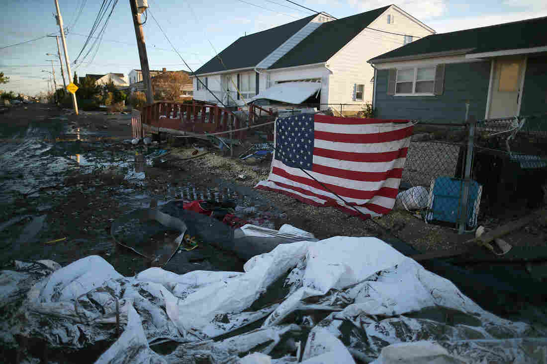 An American flag flies in front of a home damaged by Superstorm Sandy on Nov. 1, 2012, in Toms River, N.J. An American flag flies in front of a home damaged by Superstorm Sandy on Nov. 1, 2012, in Toms River, N.J.