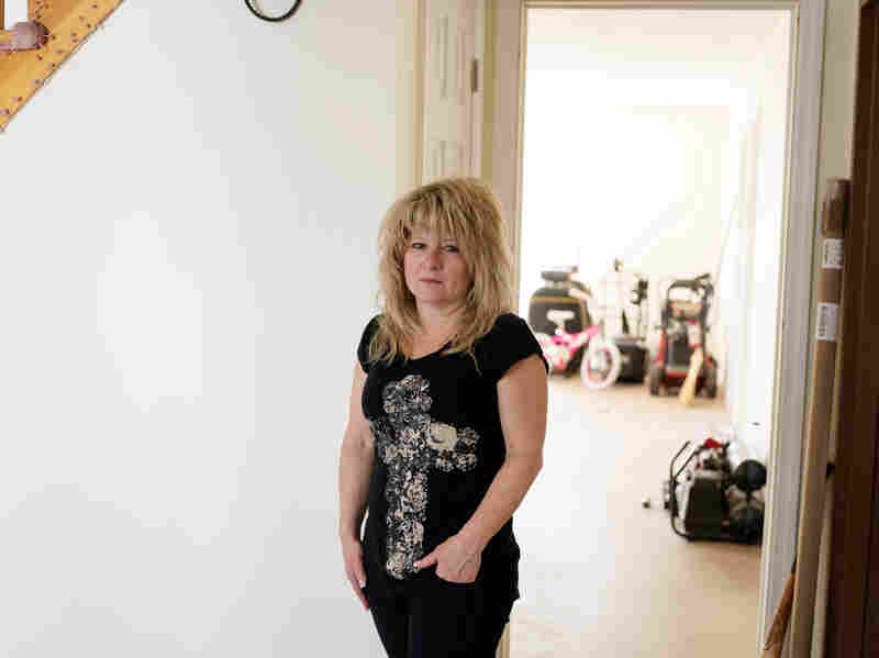 Diane Camerada stands inside her home on Staten Island, N.Y. She has been frustrated with the long bureaucratic process with the Build It Back program. Diane Camerada stands inside her home on Staten Island, N.Y. She has been frustrated with the long bureaucratic process with the Build It Back program.