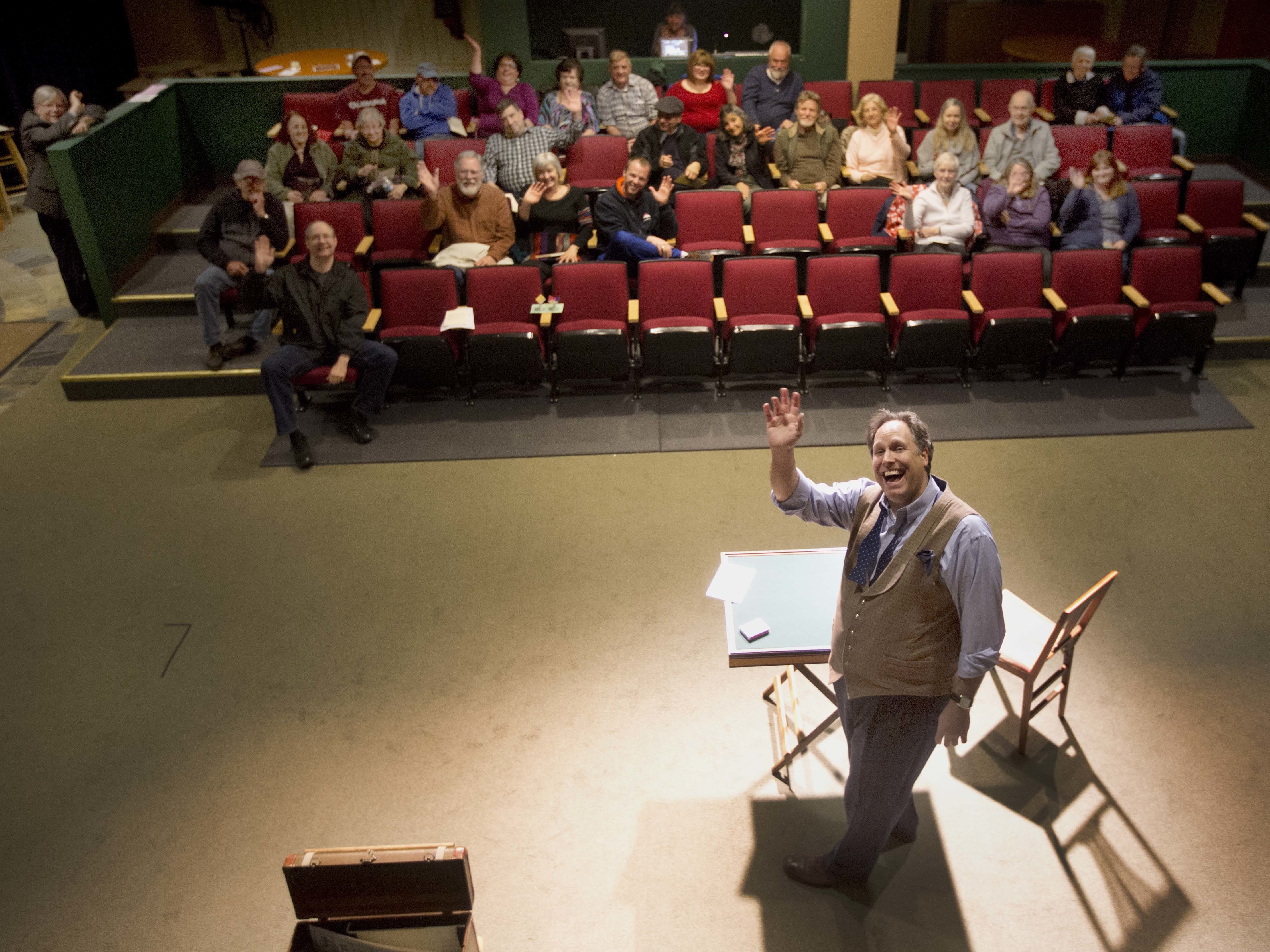 Magician Andrew Pinard waves during his performance at the Hatbox Theater in Concord, N.H. The theater took over the location of a closed clothing store at the Steeplegate Mall.