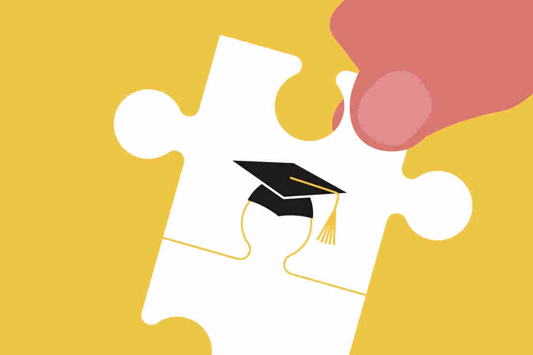 Hands joining graduate jigsaw puzzle pieces