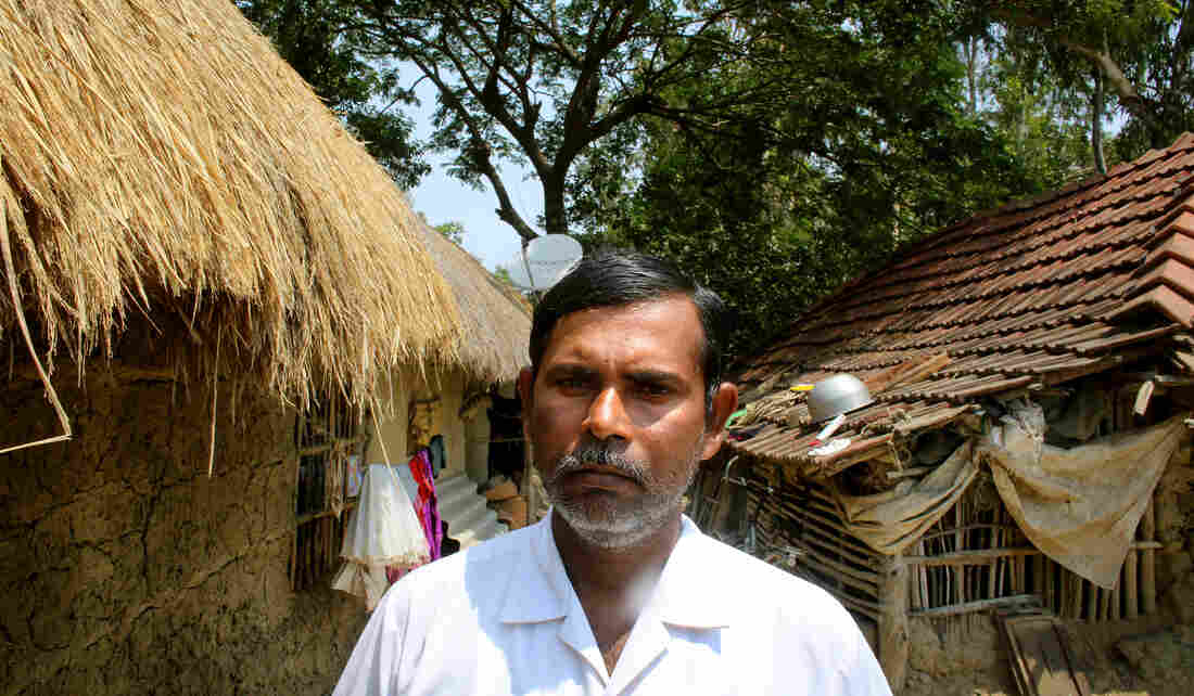 Rubil Saha has lived on Ghoramara his whole life. Saha's parents and other relatives have all left. The 45-year-old farmer worries about continually having to rebuild his house, but chooses to stay on the island. Rubil Saha has lived on Ghoramara his whole life. Saha's parents and other relatives have all left. The 45-year-old farmer worries about continually having to rebuild his house, but chooses to stay on the island.