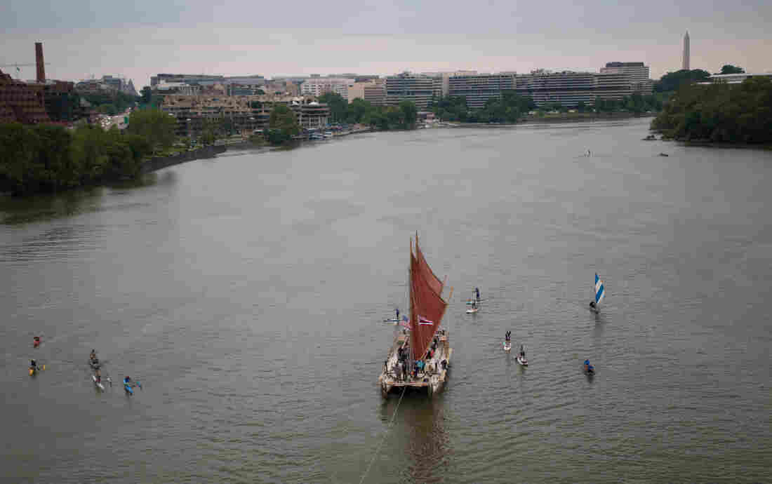 The Hokule'a, a voyaging canoe built to revive the centuries-old tradition of Polynesian exploration, makes its way up the Potomac River in Washington, D.C. Sailed by a crew of 12 who use only celestial navigation and observation of nature, the canoe is two-thirds of the way through a four-year trip around the world.