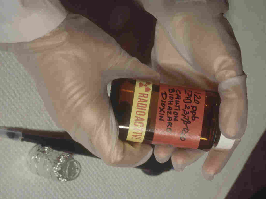 Toxicologist prepares to dilute dioxin stock for a pollution study. Dioxins are are highly toxic industrial byproducts which act as environmental pollutants. They were a component of Agent Orange and also came to public attention when they were used to poison Ukranian politician Viktor Yushchenko.