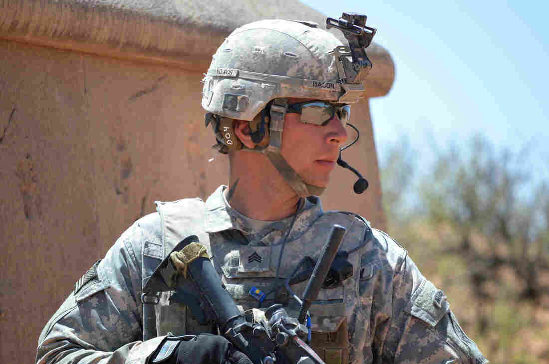 Sgt. Jessie Bacon uses the Tactical Communications and Protective System to relay information to his squad in Fort Bliss, Texas. About 20,000 of the devices have been deployed so far.