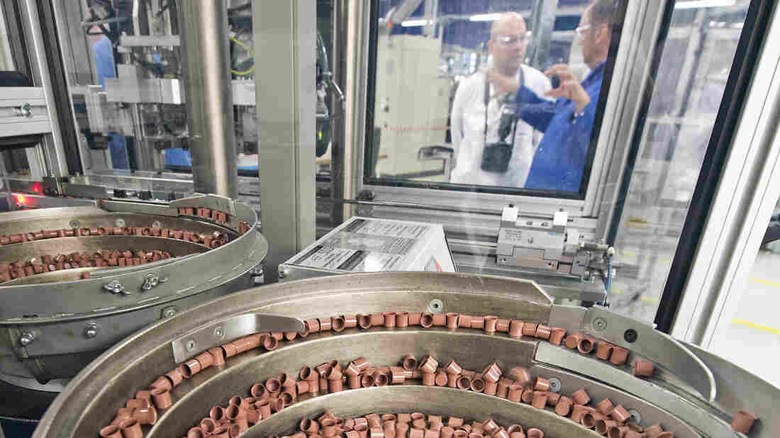 Parts of pyro-electric air bag initiators are shown in a production line at the international automotive supplier Takata Ignition Systems GmbH in Schoenebeck, Germany.