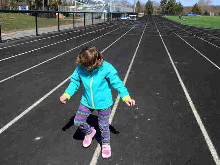 Tess Bigelow stomps it out on the track where she prepares to compete in the Special Olympics.