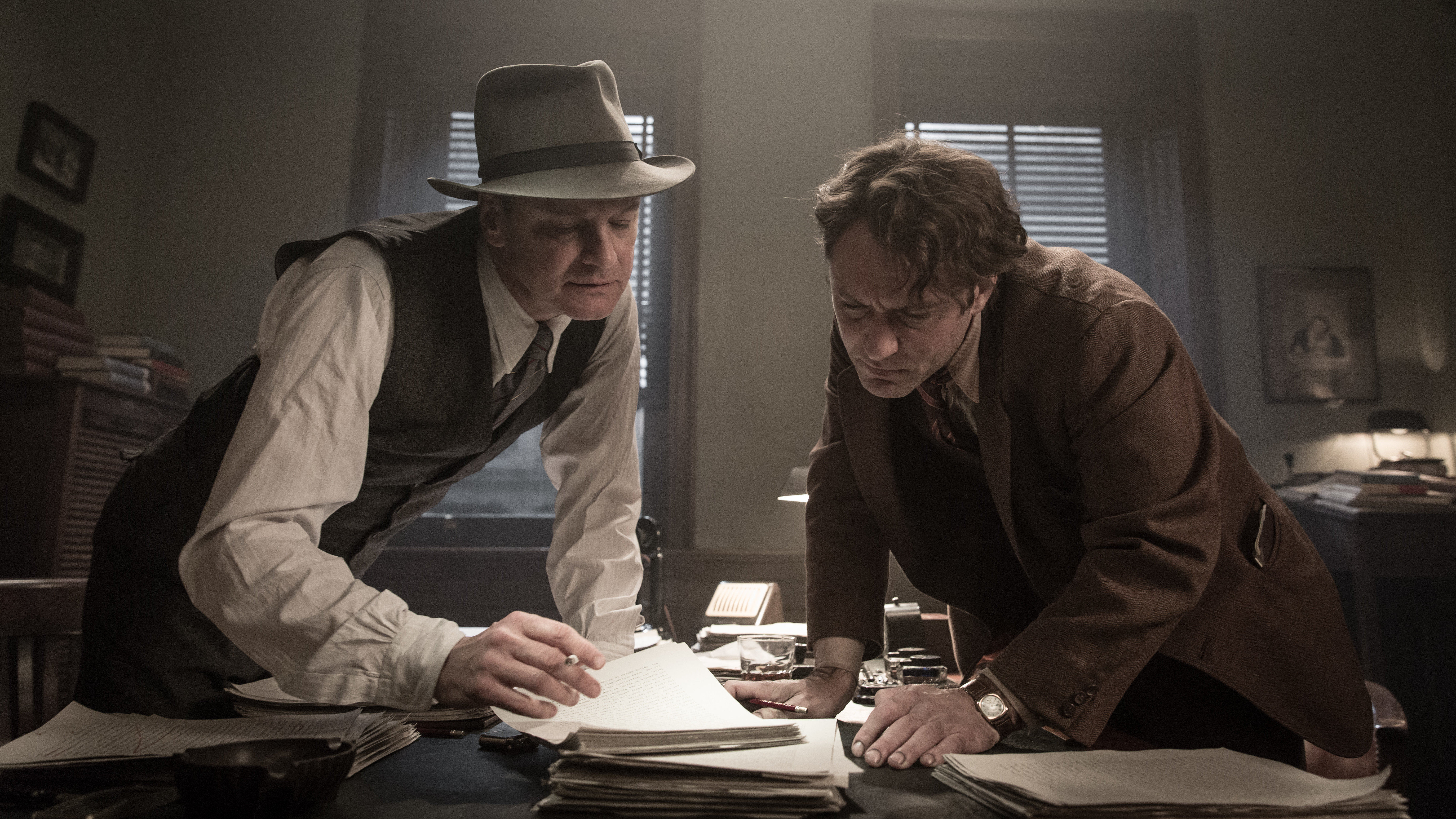 <em>Genius </em>does its best to make the editing process between Max Perkins (Colin Firth) and Thomas Wolfe (Jude Law) kinetic. (Courtesy of Roadside Attractions)