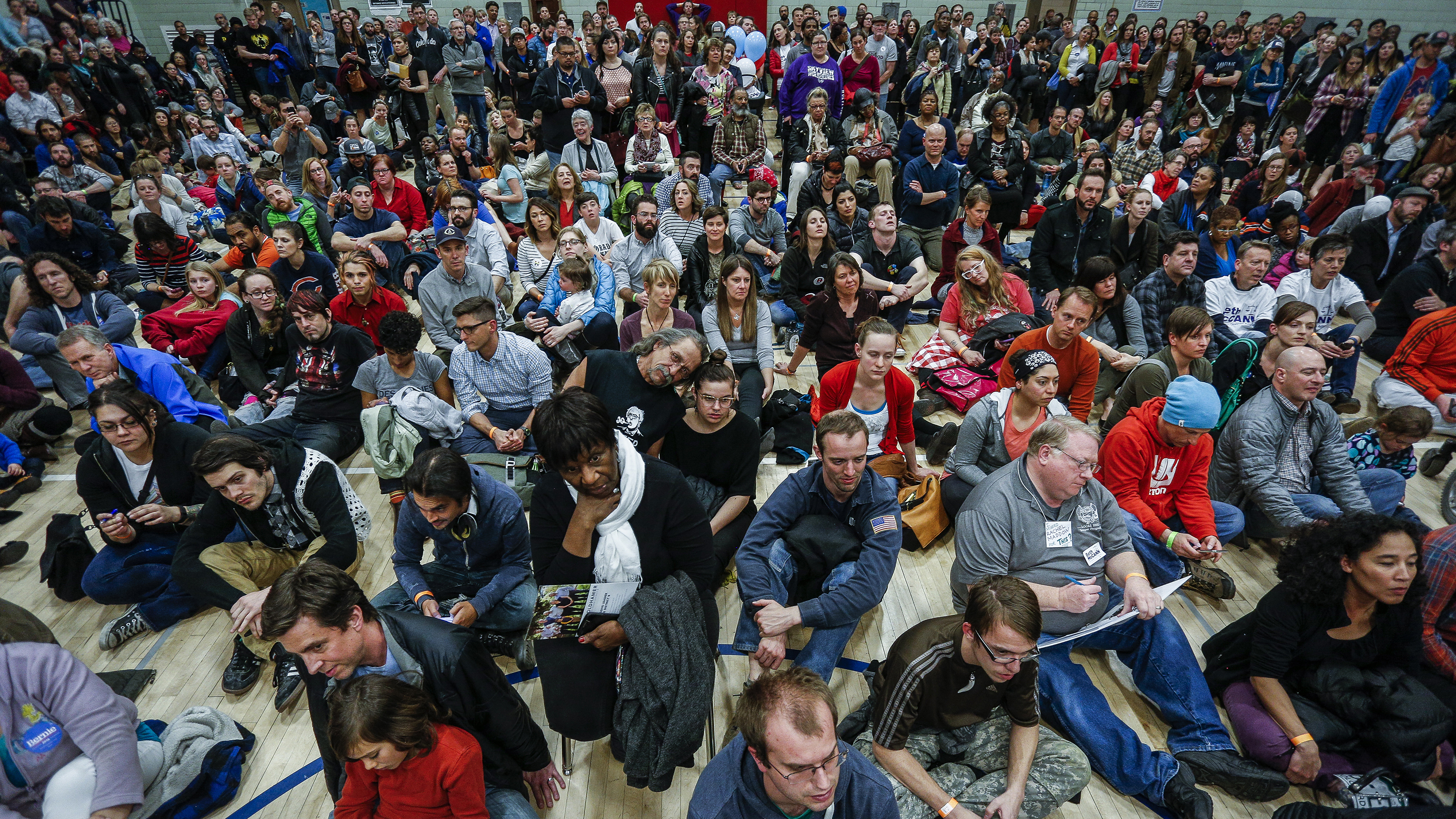 Colorado Democrats pack a gym at a Denver high school during caucuses on March 1, 2016. The crowds and long lines have led to calls for the state to move to an open primary system. (Getty Images)