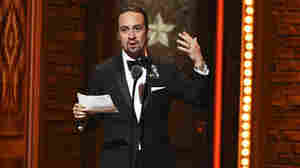 Lin-Manuel Miranda accepts the award for best book of a musical for Hamilton at the 70th Annual Tony Awards at the Beacon Theatre on Sunday.