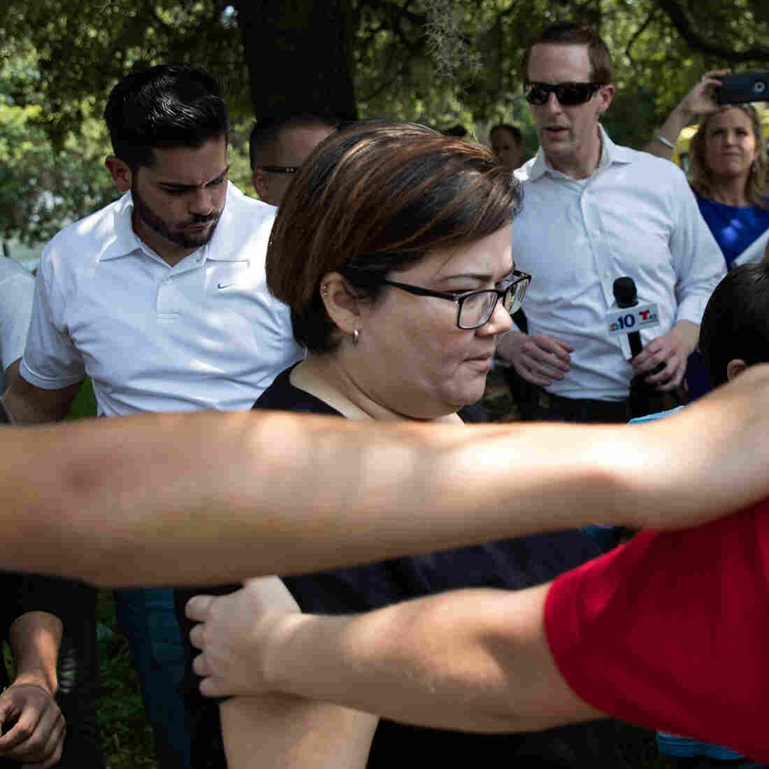 Surrounded by volunteers, family and friends of the victims of the Pulse Nightclub shooting leave the Beardall Senior Center where they gathered to learn more information about loved ones who were injured or killed in the shooting on Sunday. Surrounded by volunteers, family and friends of the victims of the Pulse Nightclub shooting leave the Beardall Senior Center where they gathered to learn more information about loved ones who were injured or killed in the shooting on Sunday.