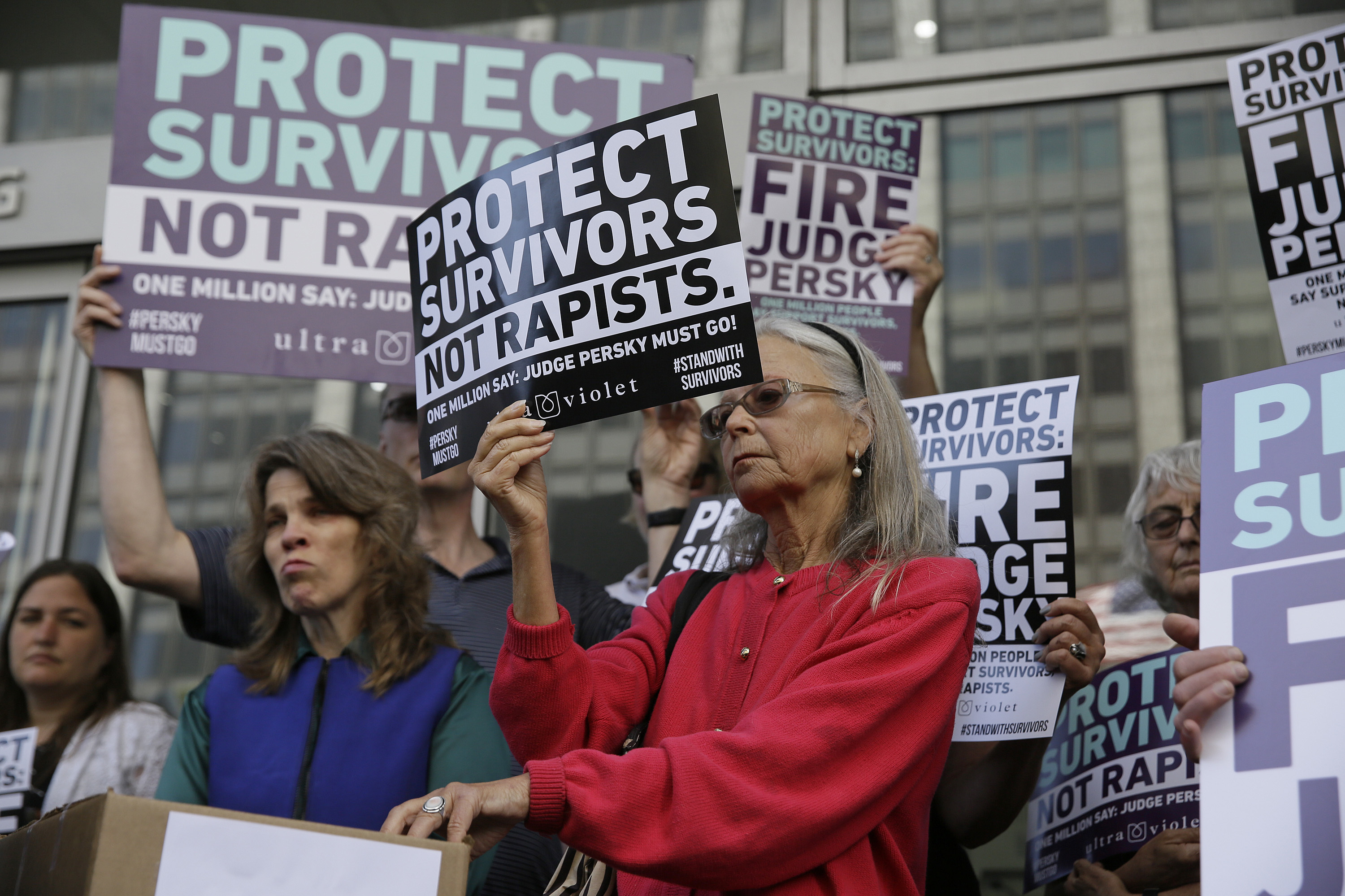 Activists from UltraViolet, a national women's advocacy organization, hold a rally Friday in San Francisco before delivering more than 1 million signatures to the California Commission on Judicial Performance calling for the removal of Judge Aaron Persky from the bench.
