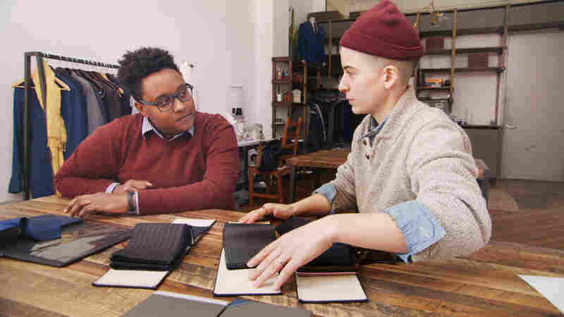 Law student Everett consults with Rae Tutera on his suit for job interviews in HBO's new documentary, Suited.