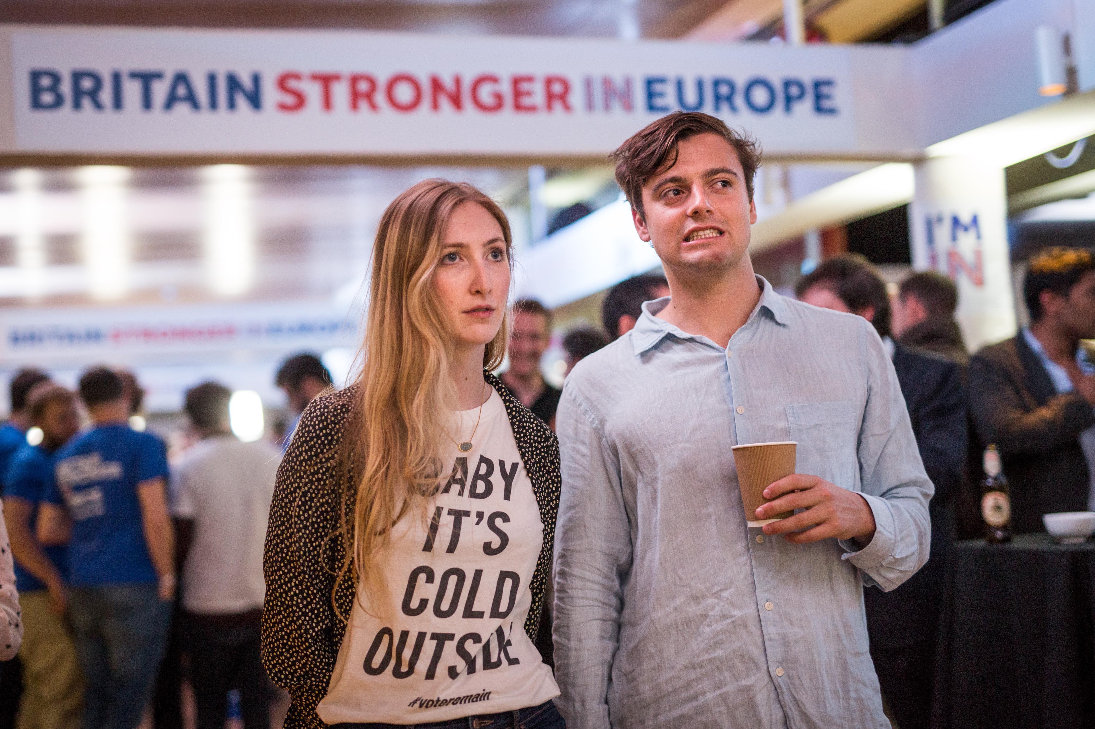 Supporters of the "Stronger In"Campaign react as results of the EU referendum are announced at a results party at the Royal Festival Hall in London early Friday morning.