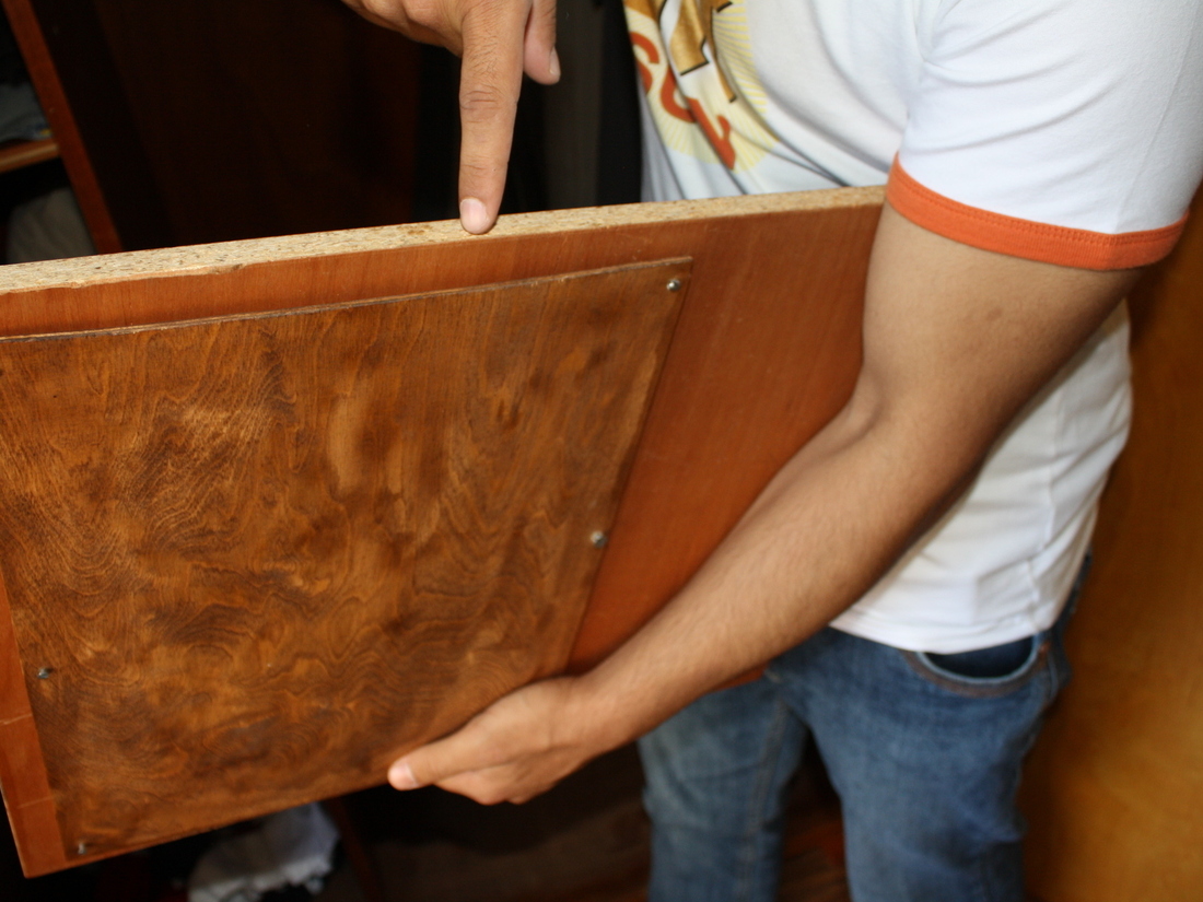 Currency and bank papers were hidden in this compartment beneath a shelf in an old wardrobe. Currency and bank papers were hidden in this compartment beneath a shelf in an old wardrobe.