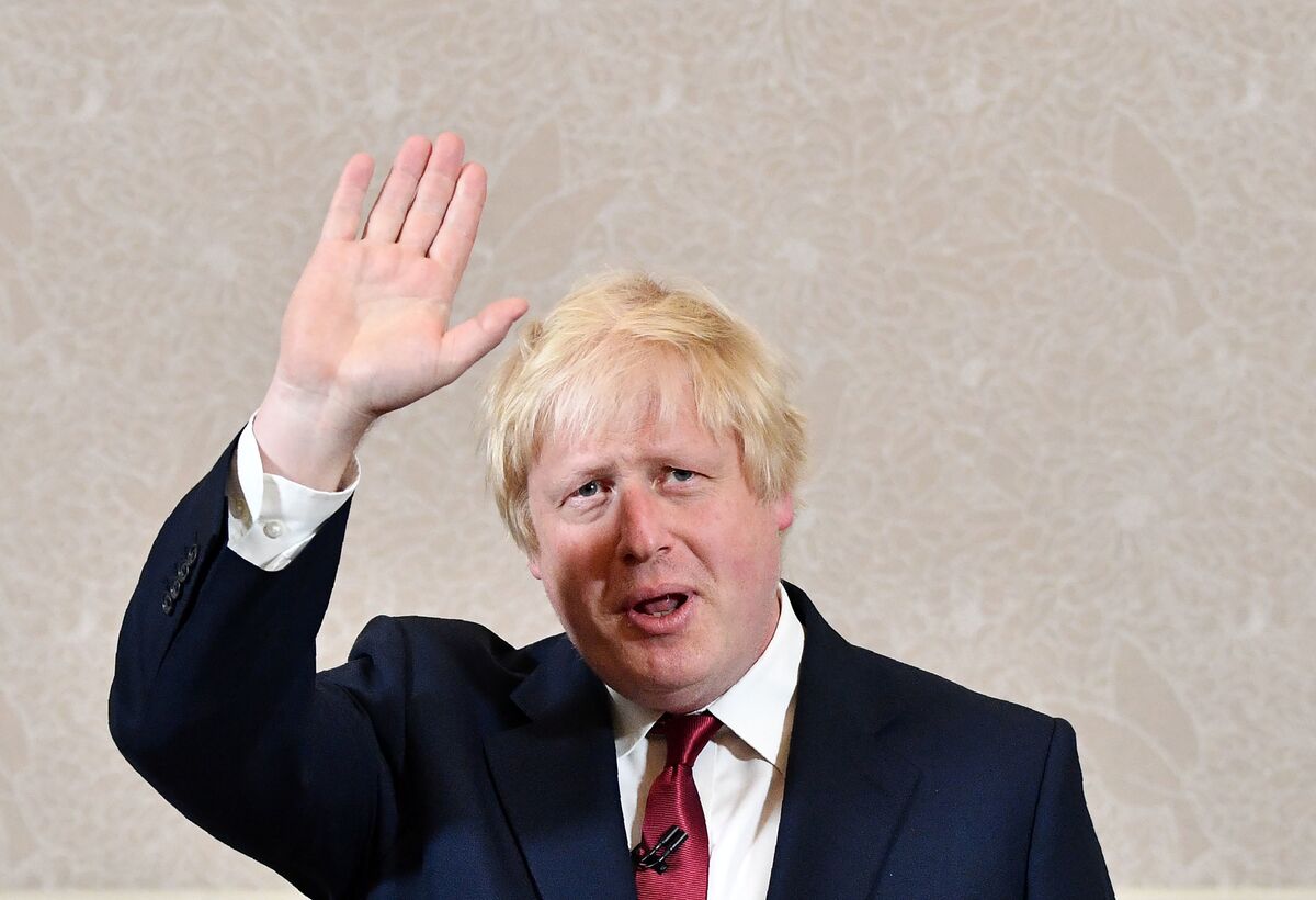 Brexit campaigner and former London mayor Boris Johnson waves after addressing a press conference in central London on Thursday. Johnson said  he will not stand to succeed Prime Minister David Cameron, as had been widely expected.