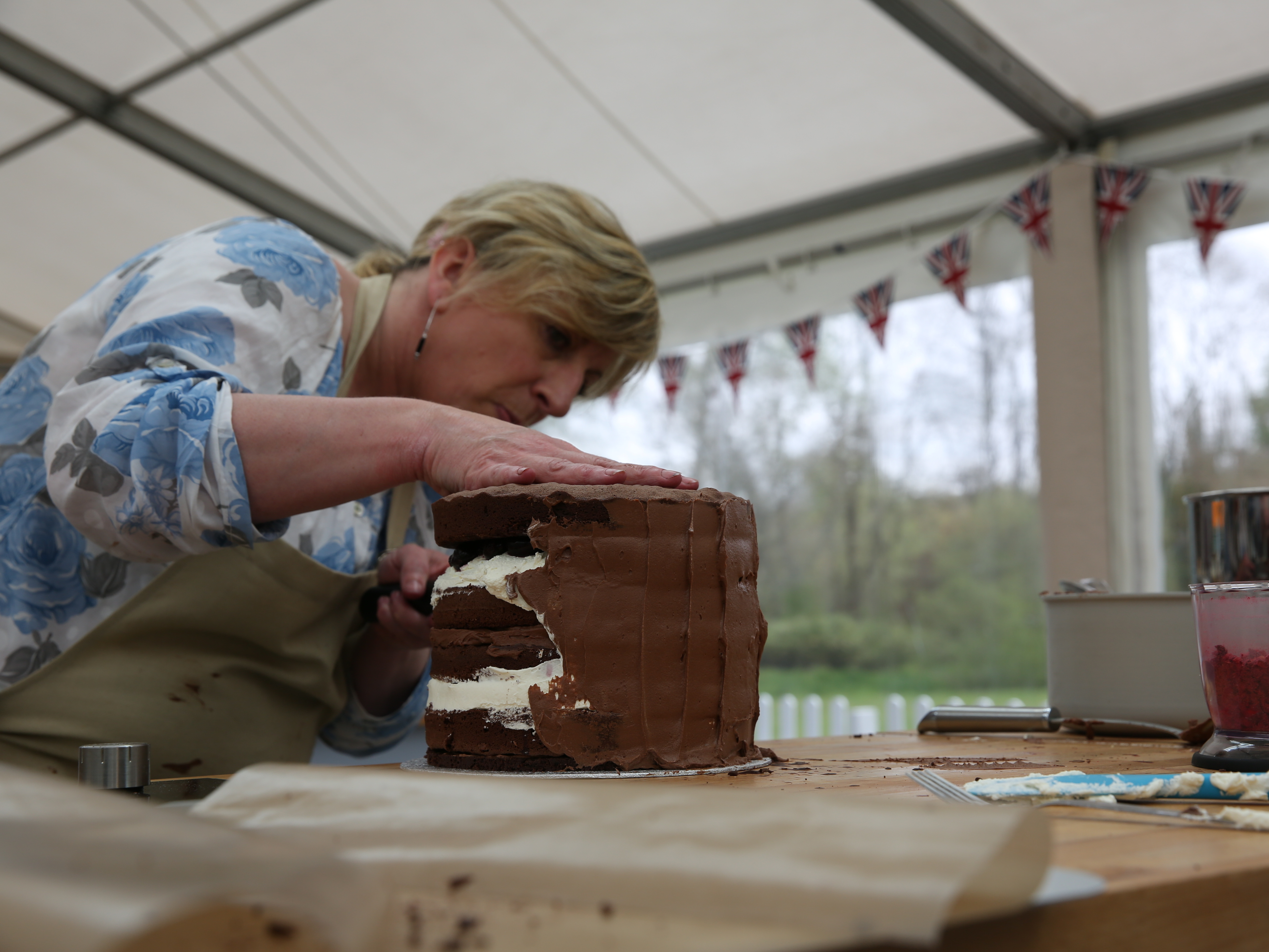 Sandy works on her cake in an episode of The Great British Baking Show, which begins its second season on Friday.