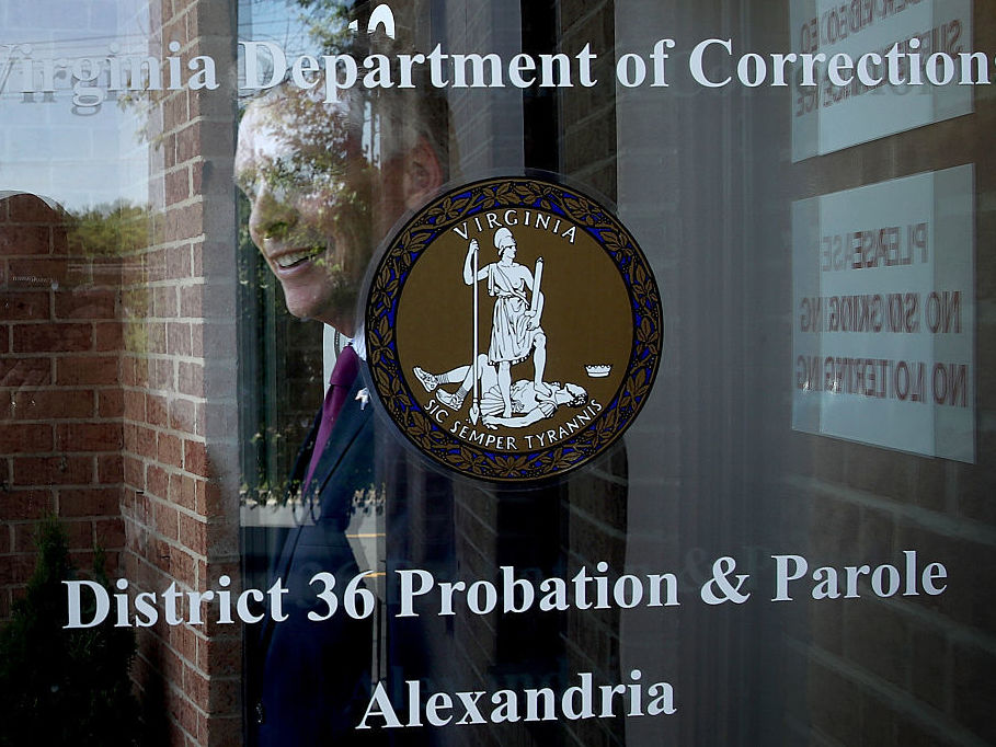 Virginia Gov. Terry McAuliffe leaves an event at the Alexandria Probation and Parole Office on May 24, 2016 in Alexandria, Virginia.