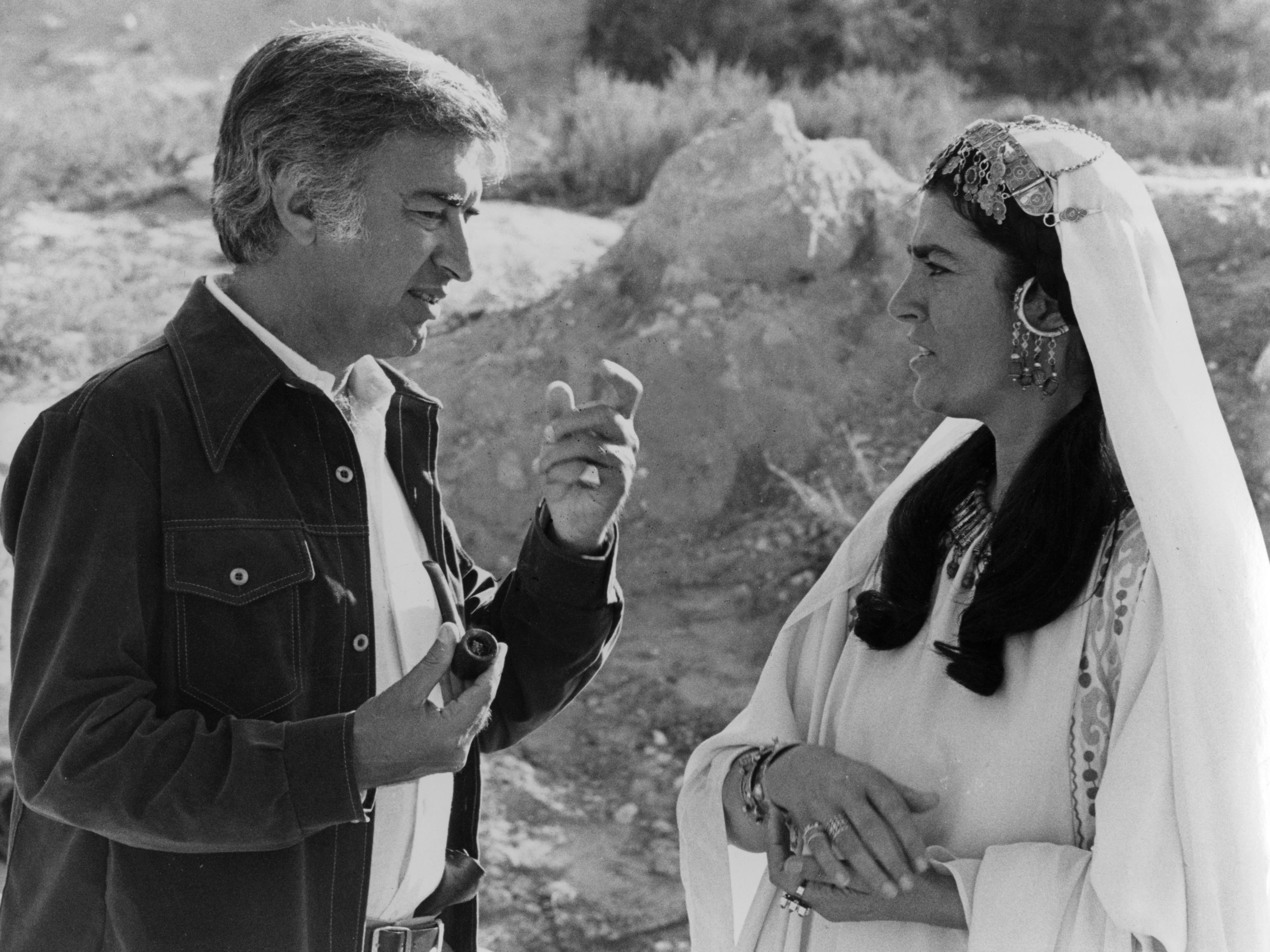 Director Moustapha Akkad (left) with actress Irene Papas during the filming of The Message. The film depicts the life of the Prophet Muhammad.