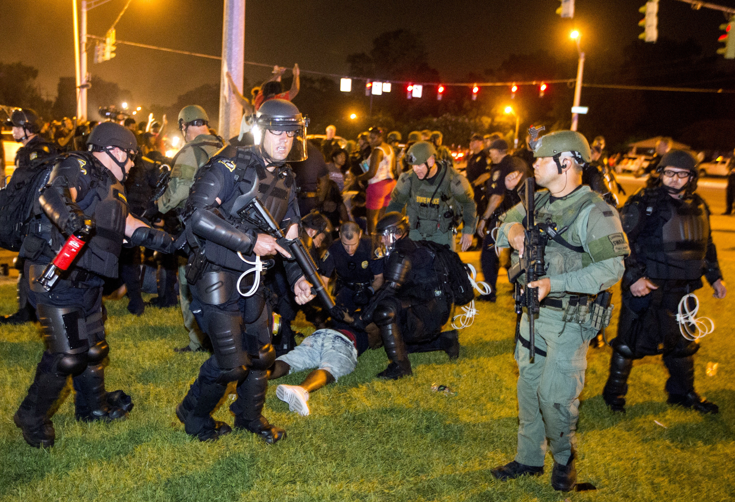 The Days After: A Nation Reacts To The Week's Violence 3 Baton Rouge police rush a crowd of protesters and start making arrests on Saturday evening in Baton Rouge, La.