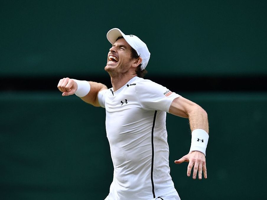 Britain's Andy Murray celebrates beating Canada's Milos Raonic during the men's singles final match on the last day of the 2016 Wimbledon Championships in Wimbledon, southwest London, on Sunday.