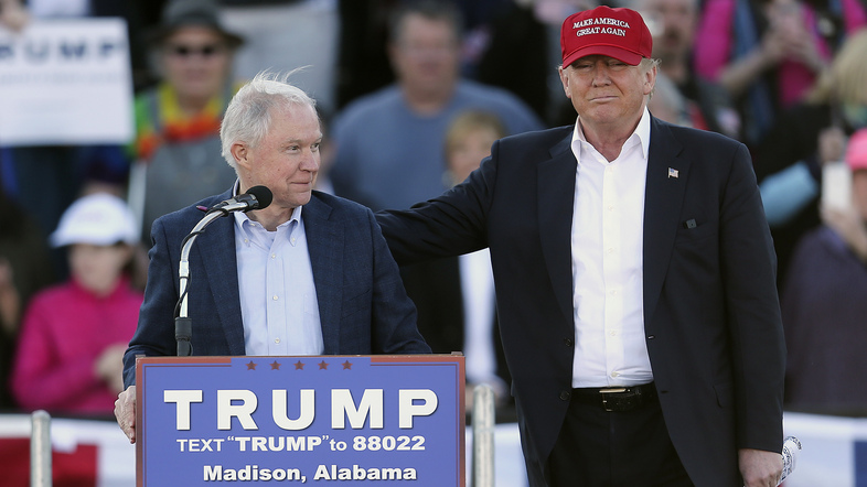 Republican presidential candidate Donald Trump, right, stands next to Sen. Jeff Sessions during a rally in Madison, Ala. on Feb. 28. (John Bazemore/AP)