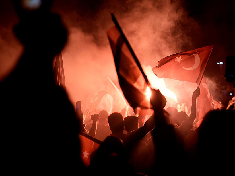 Pro-Erdogan supporters gather at Taksim square in Istanbul to support the government on July 16 following a failed coup attempt.