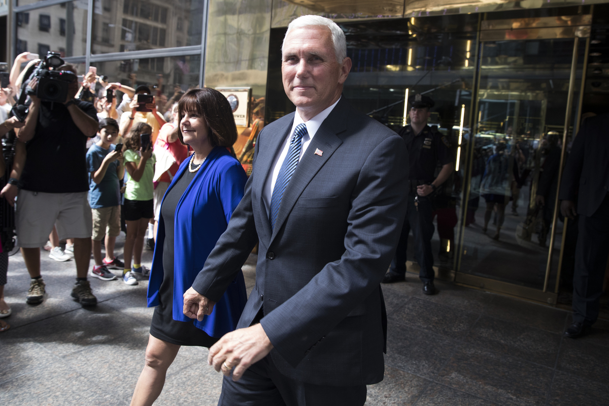 Pence and his wife, Karen, leave a meeting with Trump in New York on Friday.