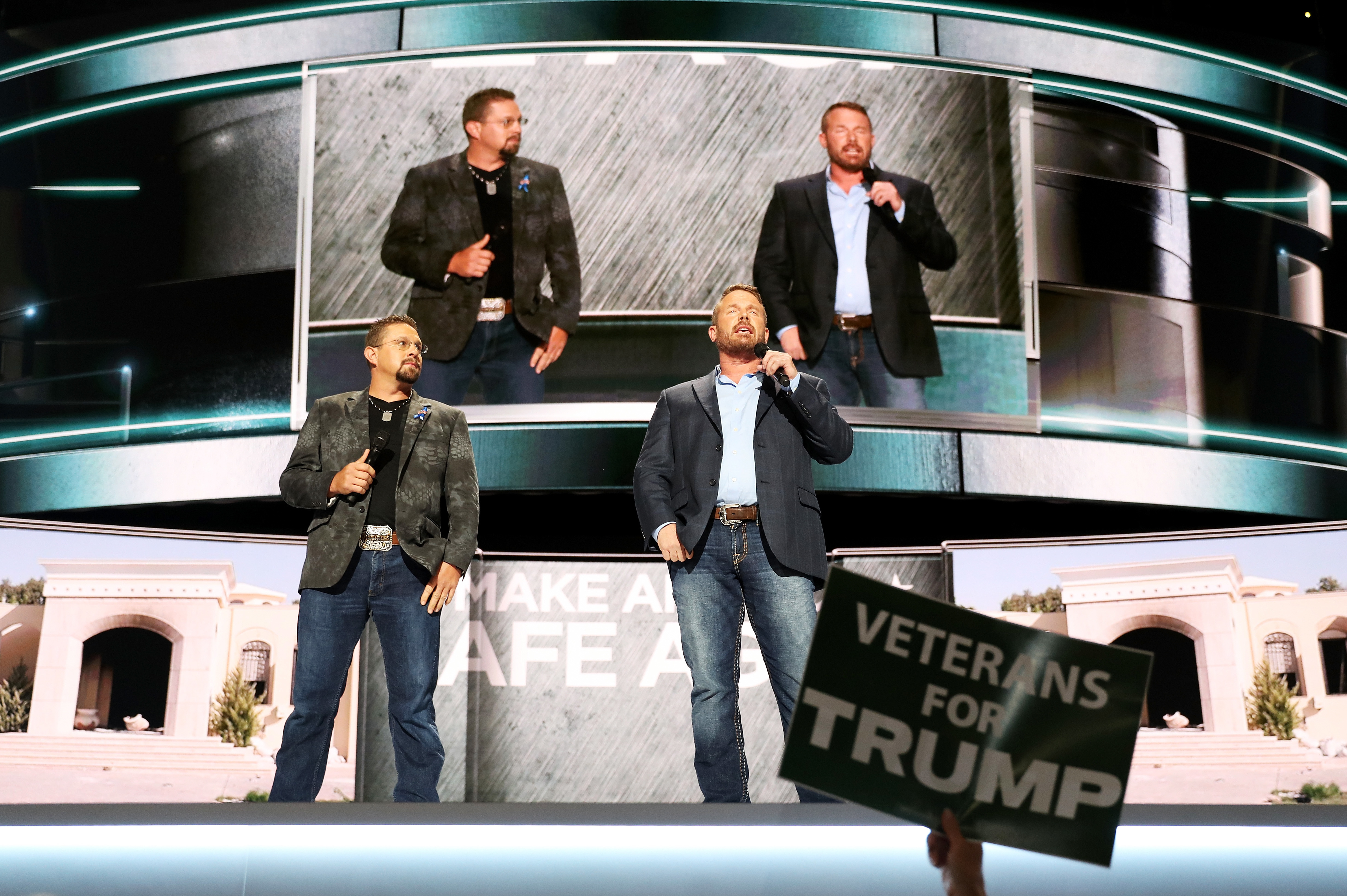 U.S. Marine Corps veterans John Tiegen (left) and Mark Geist deliver a speech on the first day of the Republican National Convention on Monday. (Getty Images)