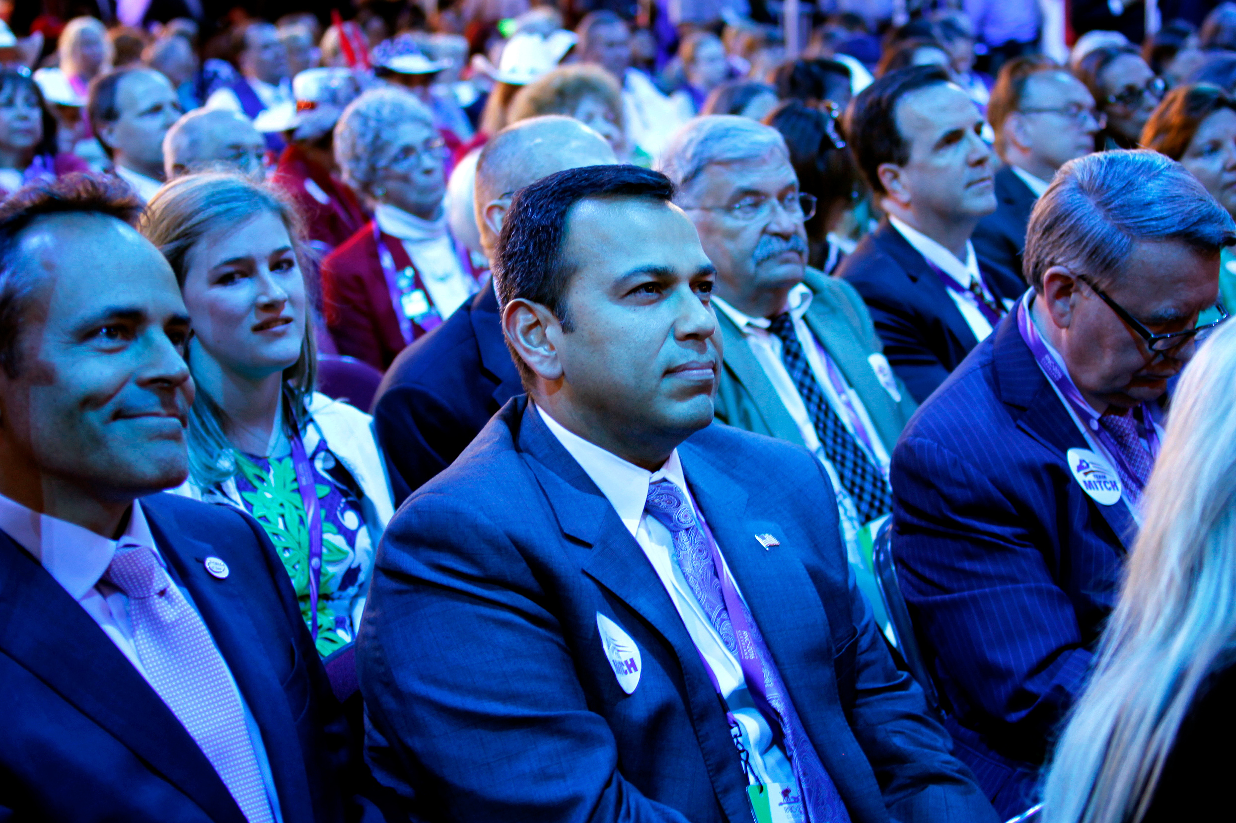 Ralph Alvarado, the first Hispanic elected to a state office in Kentucky, watches the stage on Tuesday evening. Alvarado will speak at the Republican National Convention during prime time Wednesday.