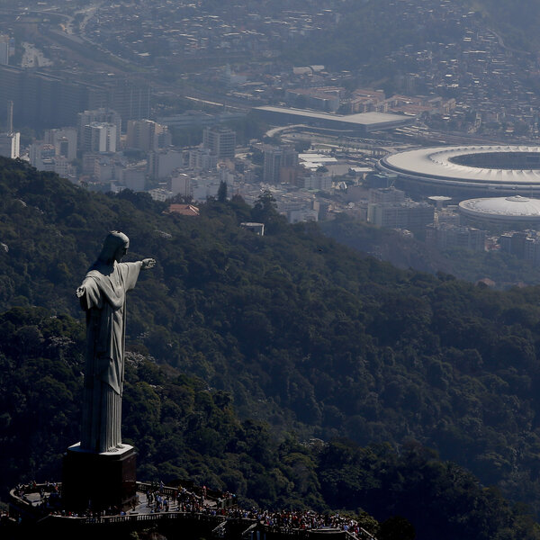 An aerial view shows Christ the Redeemer with Maracana Stadium in the background on July 4 in Rio de Janeiro.