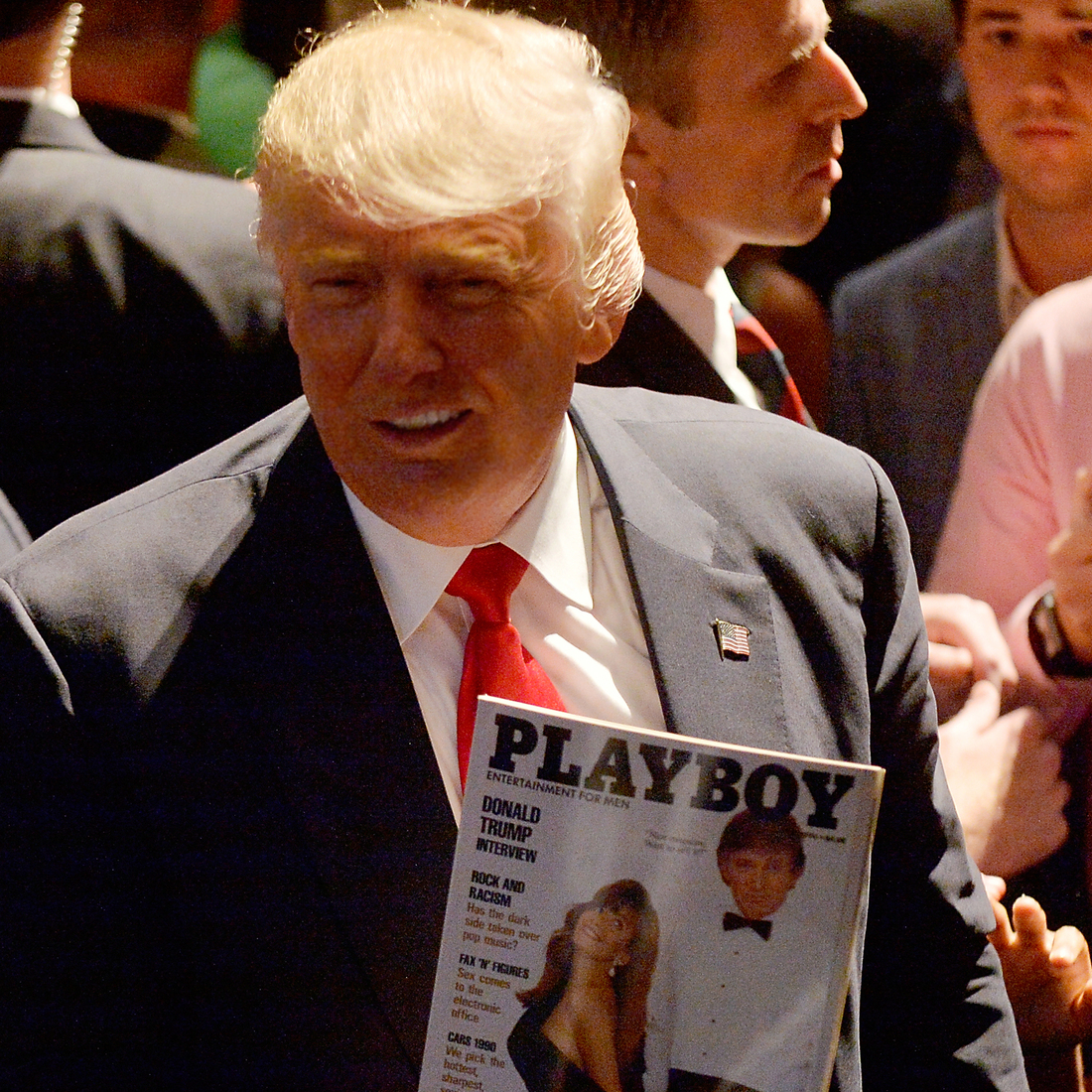 Republican presidential nominee Donald Trump shows a police officer his photo on the cover of a Playboymagazine during a campaign event at the Duke Energy Center for the Performing Arts on July 5 in Raleigh, N.C. Republican presidential nominee Donald Trump shows a police officer his photo on the cover of a Playboymagazine during a campaign event at the Duke Energy Center for the Performing Arts on July 5 in Raleigh, N.C.